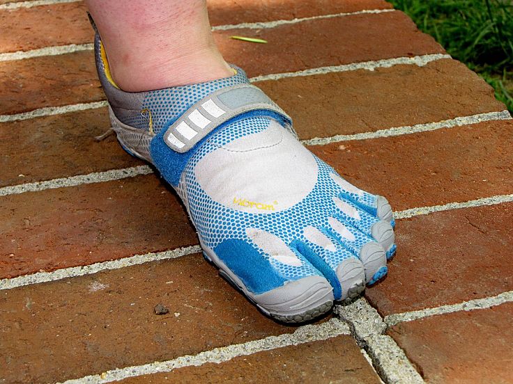 The minimalist barefoot Five Fingers shoe designed to protect from abrasion, but otherwise allow barefoot action